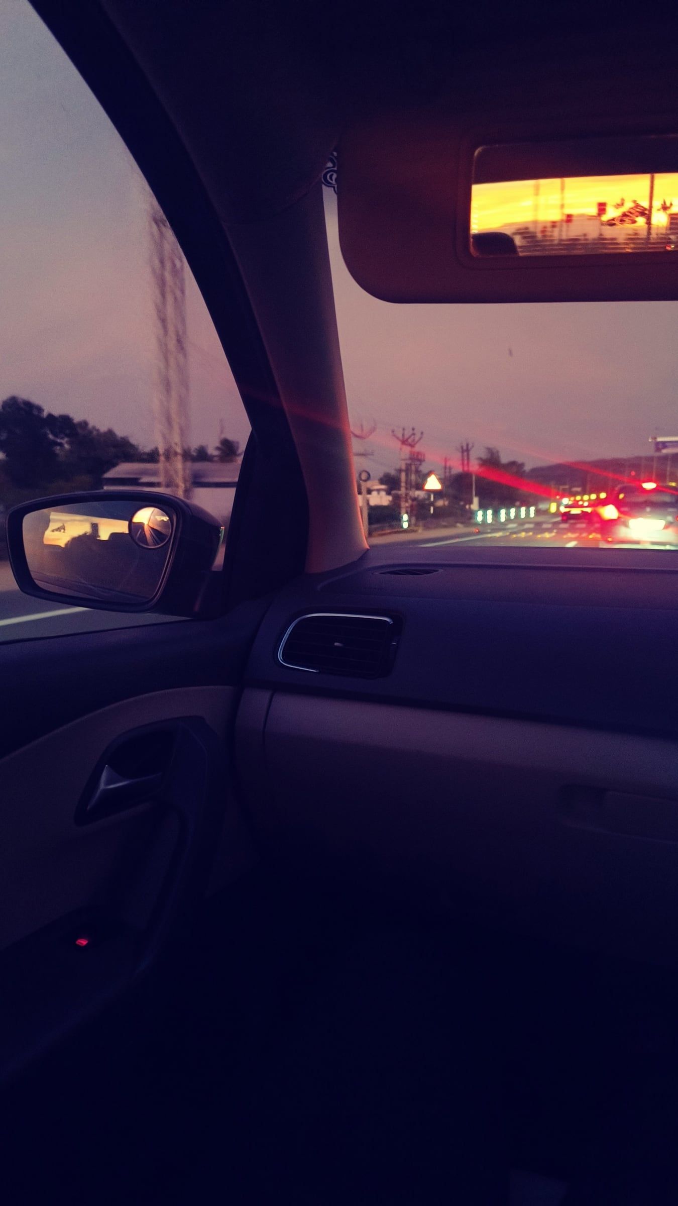 Evening sky seen from inside a car
